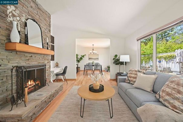 Dining room, Fireplace, Interior, Living room, Pendant Lights, Stone Walls, Wood Texture Flooring