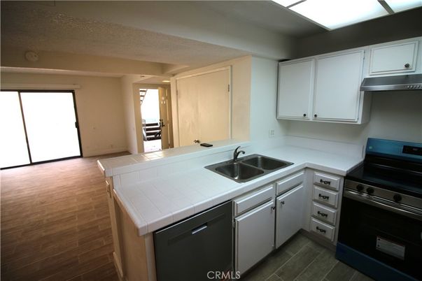 Interior, Kitchen, Tile Countertops, Wood Texture Flooring