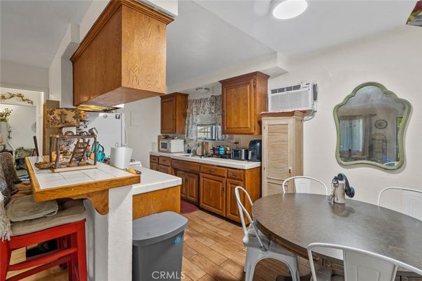Dining room, Interior, Kitchen, Tile Countertops, Wood Texture Flooring