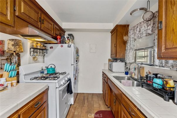 Interior, Kitchen, Tile Countertops, Wood Texture Flooring