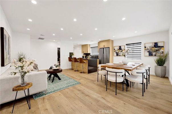 Dining room, Interior, Kitchen, Living room, Recessed Lighting, Stainless Steel Appliances, Wood Texture Flooring