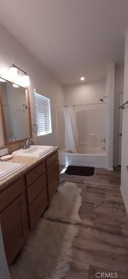Bathroom, Dual Sink Vanities, Interior, Recessed Lighting, Wood Texture Flooring
