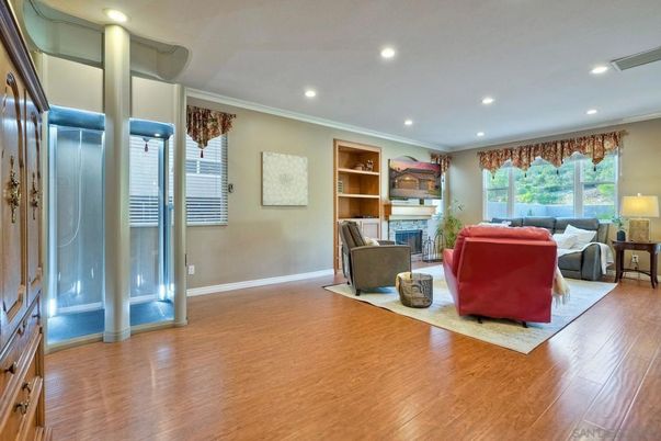 Fireplace, Interior, Living room, Recessed Lighting, Wood Texture Flooring