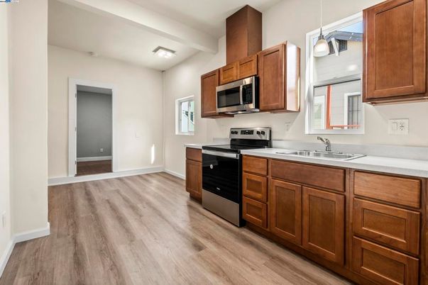 Interior, Kitchen, Pendant Lights, Stainless Steel Appliances, Wood Texture Flooring