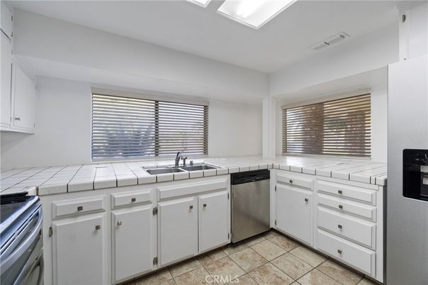 Interior, Kitchen, Stainless Steel Appliances, Tile Countertops