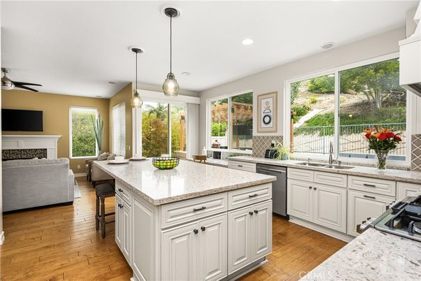 Fireplace, Interior, Kitchen, Pendant Lights, Recessed Lighting, Wood Texture Flooring