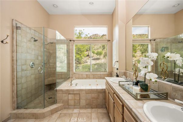 Bathroom, Dual Sink Vanities, Glass Shower, Interior, Recessed Lighting, Tile Countertops