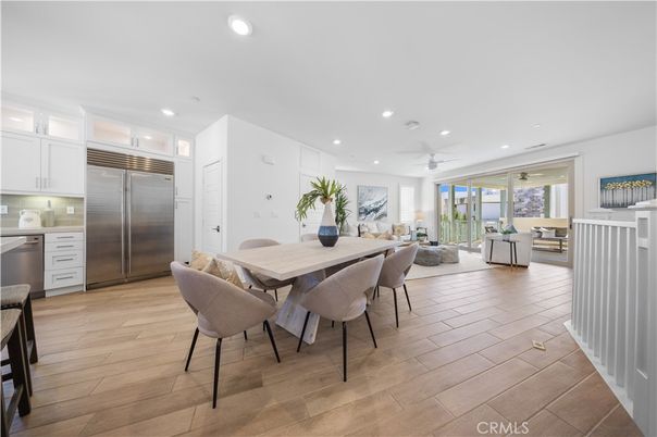 Dining room, Interior, Kitchen, Living room, Recessed Lighting, Stainless Steel Appliances, Wood Texture Flooring