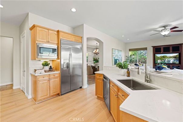 Chandelier, Interior, Kitchen, Pendant Lights, Recessed Lighting, Stainless Steel Appliances, Wood Texture Flooring