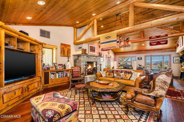 Chandelier, Fireplace, Interior, Living room, Recessed Lighting, Wooden Beams, Wooden Ceilings, Wood Texture Flooring