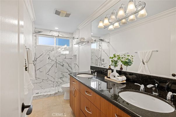 Bathroom, Dual Sink Vanities, Glass Shower, Interior, Marble Walls, Recessed Lighting