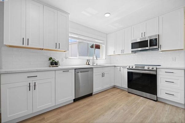 Interior, Kitchen, Recessed Lighting, Stainless Steel Appliances, Wood Texture Flooring