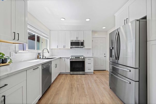Interior, Kitchen, Recessed Lighting, Stainless Steel Appliances, Wood Texture Flooring