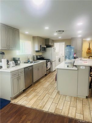 Interior, Kitchen, Recessed Lighting, Stainless Steel Appliances, Wood Texture Flooring