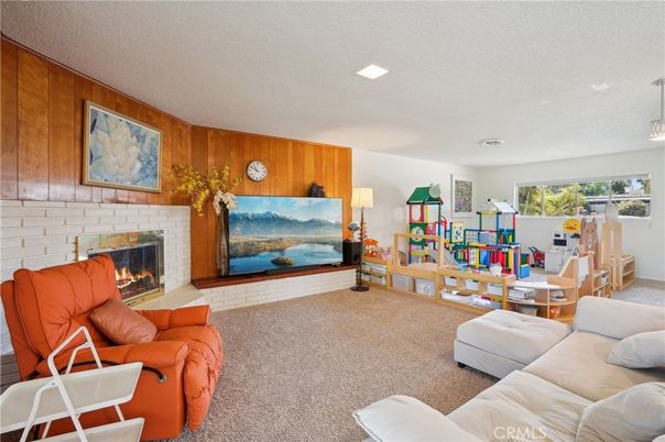 Fireplace, Interior, Living room, Pendant Lights, Recessed Lighting, Stone Walls, Wooden Walls