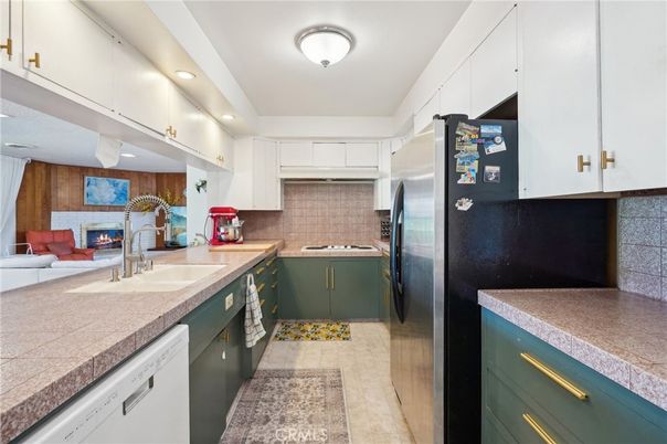 Fireplace, Interior, Kitchen, Recessed Lighting, Tile Countertops