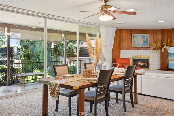 Dining room, Fireplace, Interior, Living room, Recessed Lighting, Wooden Walls