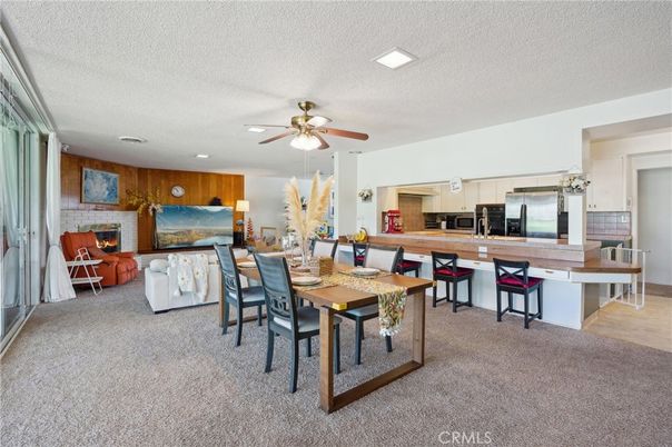 Dining room, Fireplace, Interior, Kitchen, Living room, Recessed Lighting, Stainless Steel Appliances