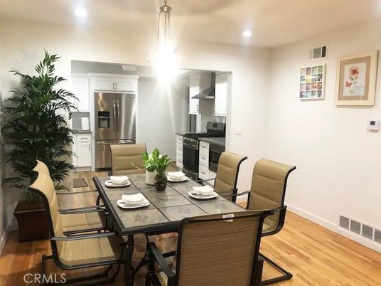 Dining room, Interior, Kitchen, Recessed Lighting, Stainless Steel Appliances, Wood Texture Flooring