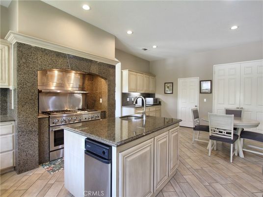 Dining room, Interior, Kitchen, Recessed Lighting, Stainless Steel Appliances, Wood Texture Flooring