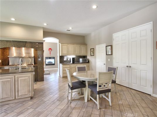 Dining room, Interior, Kitchen, Recessed Lighting, Stainless Steel Appliances, Wood Texture Flooring
