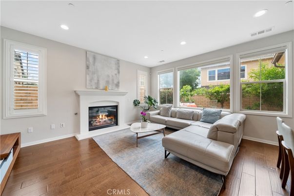 Fireplace, Interior, Living room, Recessed Lighting, Wood Texture Flooring