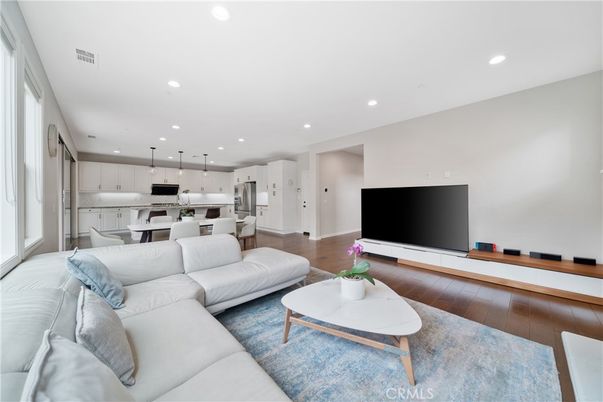 Dining room, Interior, Kitchen, Living room, Pendant Lights, Recessed Lighting, Stainless Steel Appliances, Wood Texture Flooring
