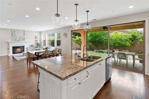 Dining room, Fireplace, Interior, Kitchen, Pendant Lights, Recessed Lighting, Wood Texture Flooring