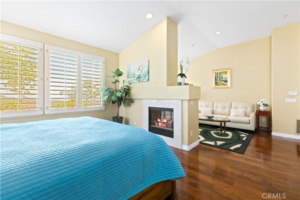 Bedroom, Fireplace, Interior, Recessed Lighting, Wood Texture Flooring