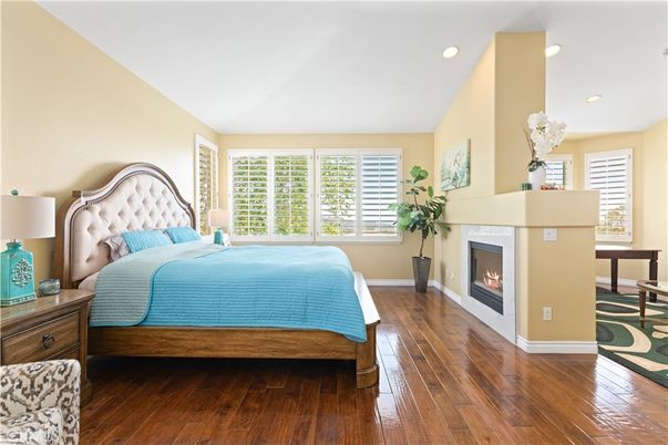 Bedroom, Fireplace, Interior, Recessed Lighting, Wood Texture Flooring