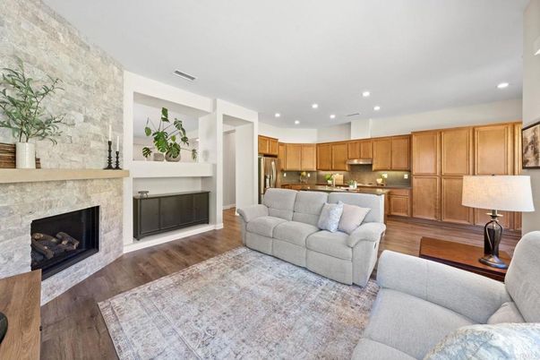 Fireplace, Interior, Kitchen, Living room, Recessed Lighting, Stainless Steel Appliances, Stone Walls, Wood Texture Flooring