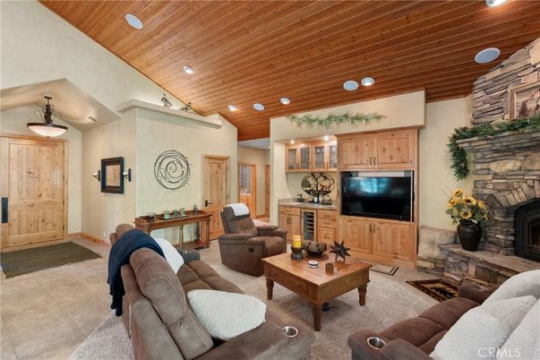 Fireplace, Interior, Living room, Recessed Lighting, Stone Walls, Wooden Ceilings