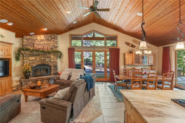 Dining room, Fireplace, Interior, Living room, Pendant Lights, Recessed Lighting, Stone Walls, Wooden Ceilings