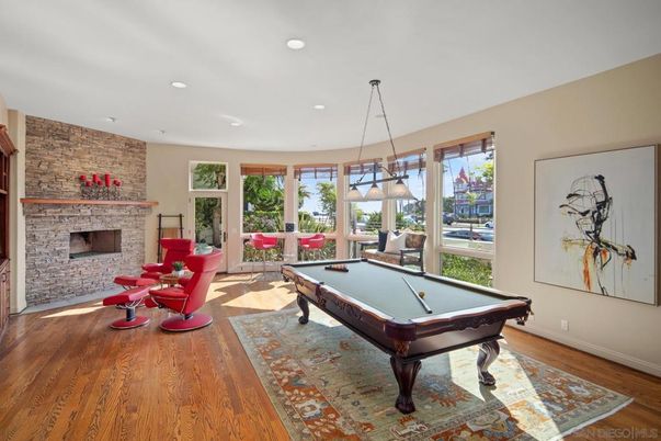 Billiard Table, Fireplace, Game Room, Interior, Pendant Lights, Recessed Lighting, Stone Walls, Wood Texture Flooring