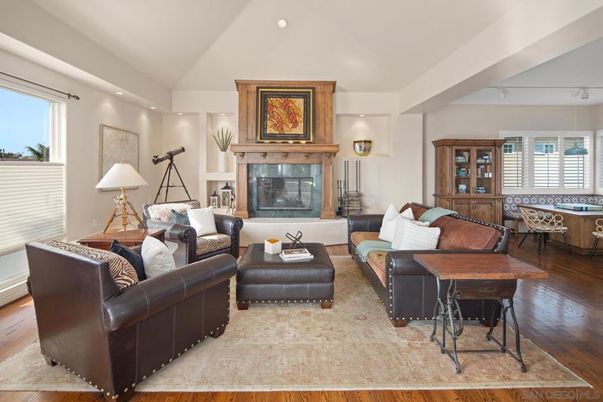 Fireplace, Game Room, Interior, Living room, Recessed Lighting, Wood Texture Flooring