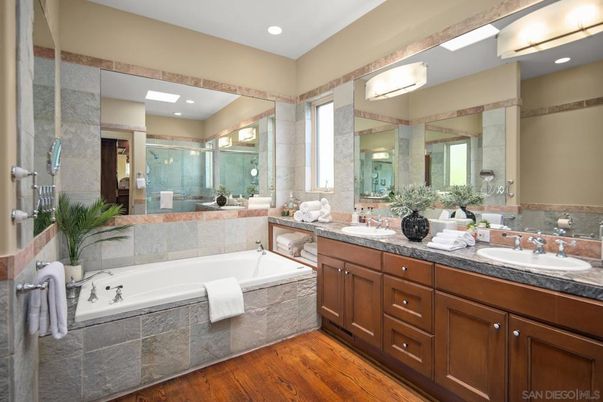 Bathroom, Dual Sink Vanities, Glass Shower, Interior, Recessed Lighting, Wood Texture Flooring