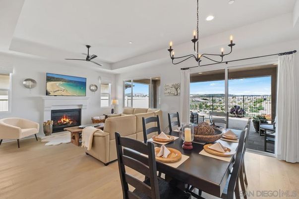 Chandelier, Dining room, Fireplace, Interior, Living room, Recessed Lighting, Wood Texture Flooring