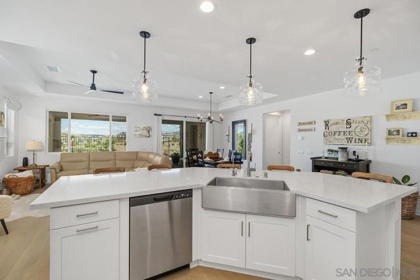 Dining room, Interior, Kitchen, Living room, Pendant Lights, Recessed Lighting, Stainless Steel Appliances, Wood Texture Flooring