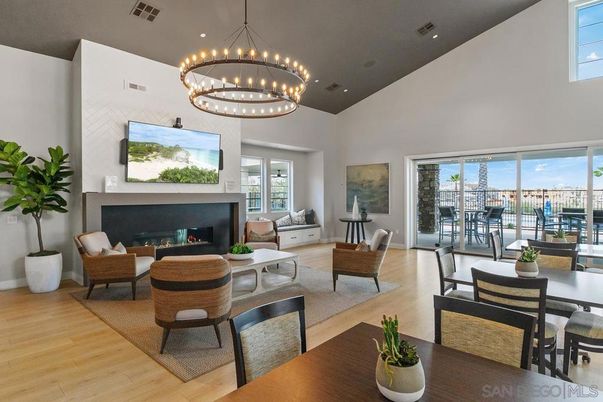 Chandelier, Dining room, Fireplace, Interior, Living room, Pendant Lights, Recessed Lighting, Water, Wood Texture Flooring