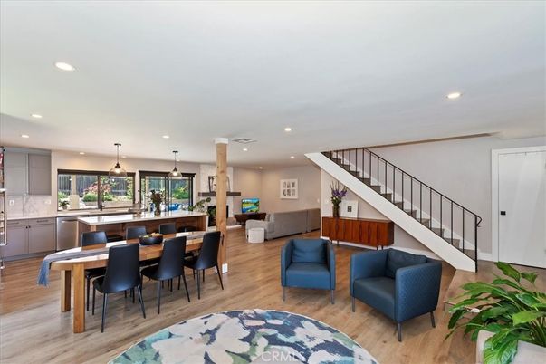 Dining room, Interior, Kitchen, Living room, Pendant Lights, Recessed Lighting, Stainless Steel Appliances, Wood Texture Flooring
