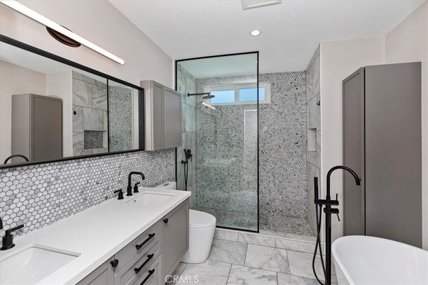 Bathroom, Dual Sink Vanities, Glass Shower, Interior, Marble, Recessed Lighting