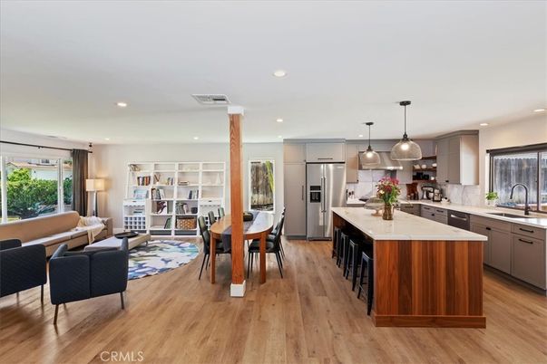 Dining room, Interior, Kitchen, Living room, Pendant Lights, Recessed Lighting, Stainless Steel Appliances, Wood Texture Flooring