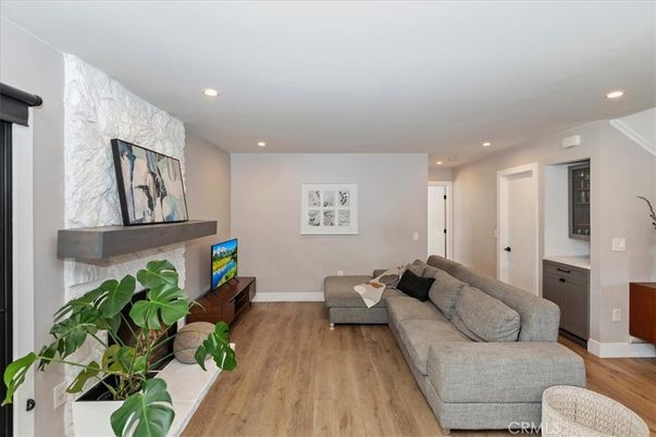 Fireplace, Interior, Living room, Recessed Lighting, Wood Texture Flooring