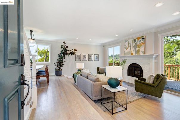 Dining room, Fireplace, Interior, Living room, Pendant Lights, Recessed Lighting, Wood Texture Flooring