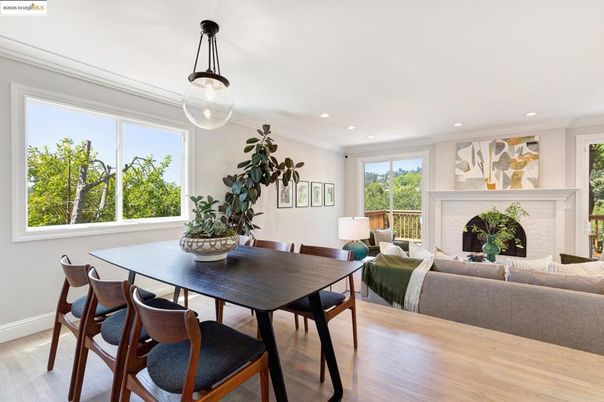 Dining room, Fireplace, Interior, Living room, Pendant Lights, Recessed Lighting, Wood Texture Flooring