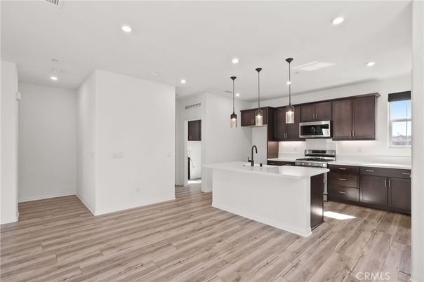 Interior, Kitchen, Pendant Lights, Recessed Lighting, Stainless Steel Appliances, Wood Texture Flooring