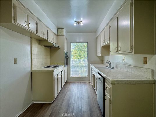 Interior, Kitchen, Tile Countertops, Wood Texture Flooring