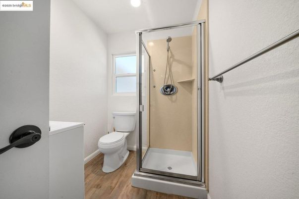 Bathroom, Glass Shower, Interior, Recessed Lighting, Wood Texture Flooring