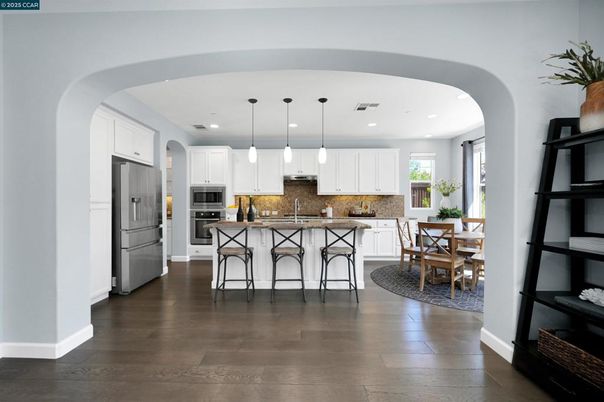 Dining room, Interior, Kitchen, Pendant Lights, Recessed Lighting, Stainless Steel Appliances, Wood Texture Flooring
