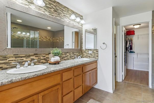 Bathroom, Dual Sink Vanities, Interior, Recessed Lighting, Walk-in Closets, Wood Texture Flooring